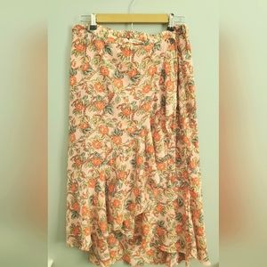 Midi light pink skirt with red flowers and green leaves. Size XL